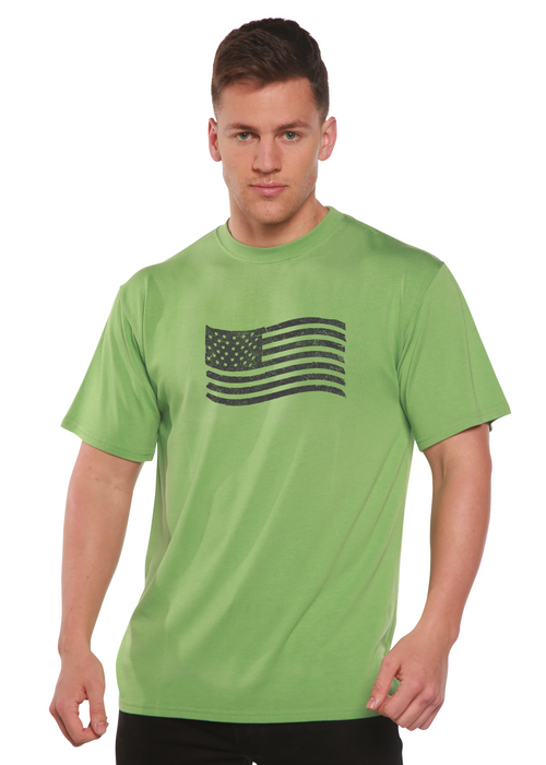 Man wearing a green t-shirt with an American flag design on a white background
