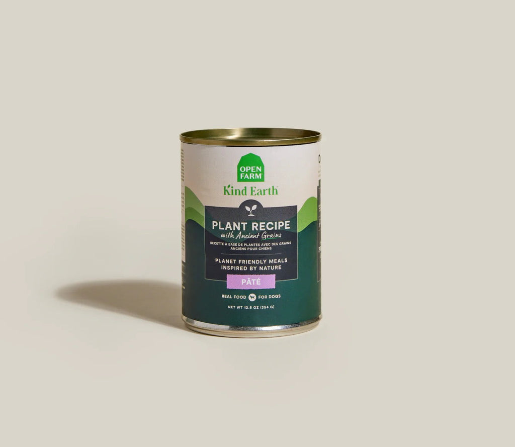 Can of Kind Earth plant recipe pet food on a beige background