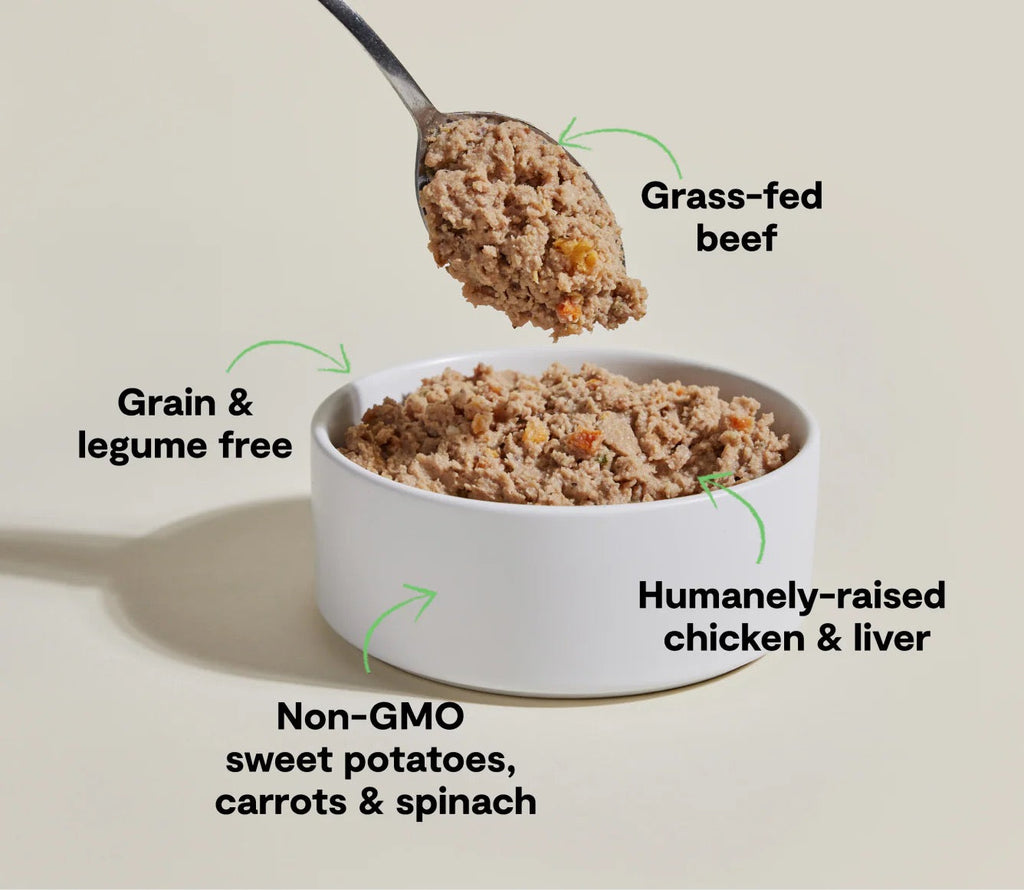 Cat food in a bowl with text highlighting ingredients on a beige background