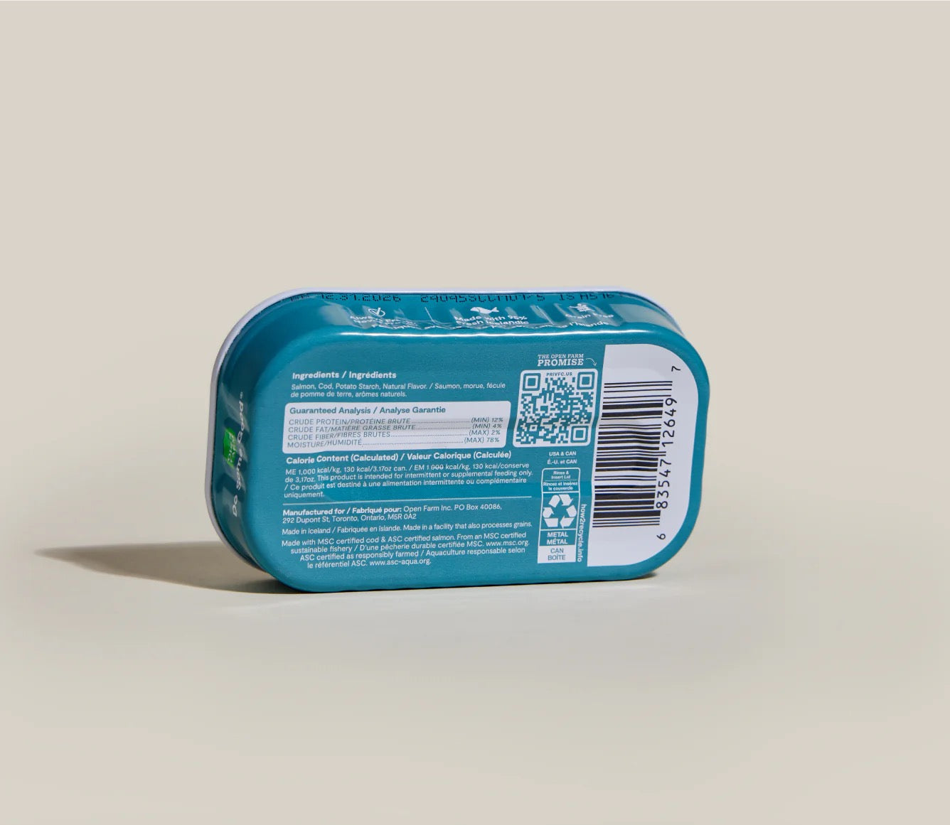 Blue rectangular container with a label on a beige background