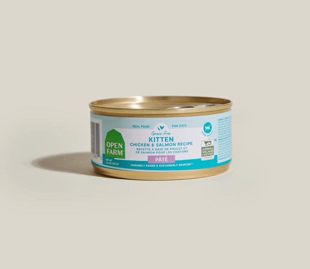 Can of Open Farm kitten food with chicken and salmon recipe on a beige background