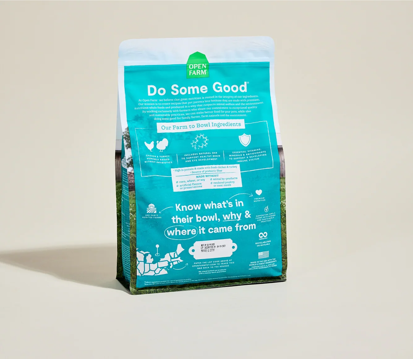Teal bag with white text on a beige background