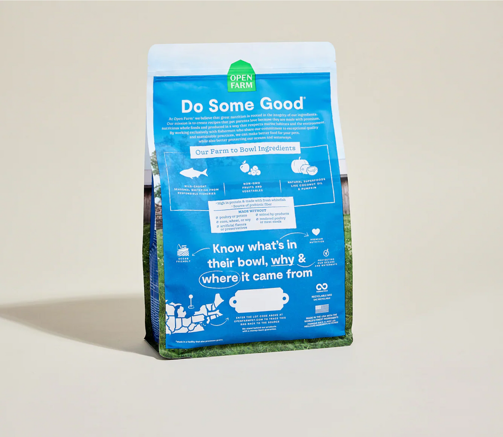 Dog food bag with blue label on a beige background