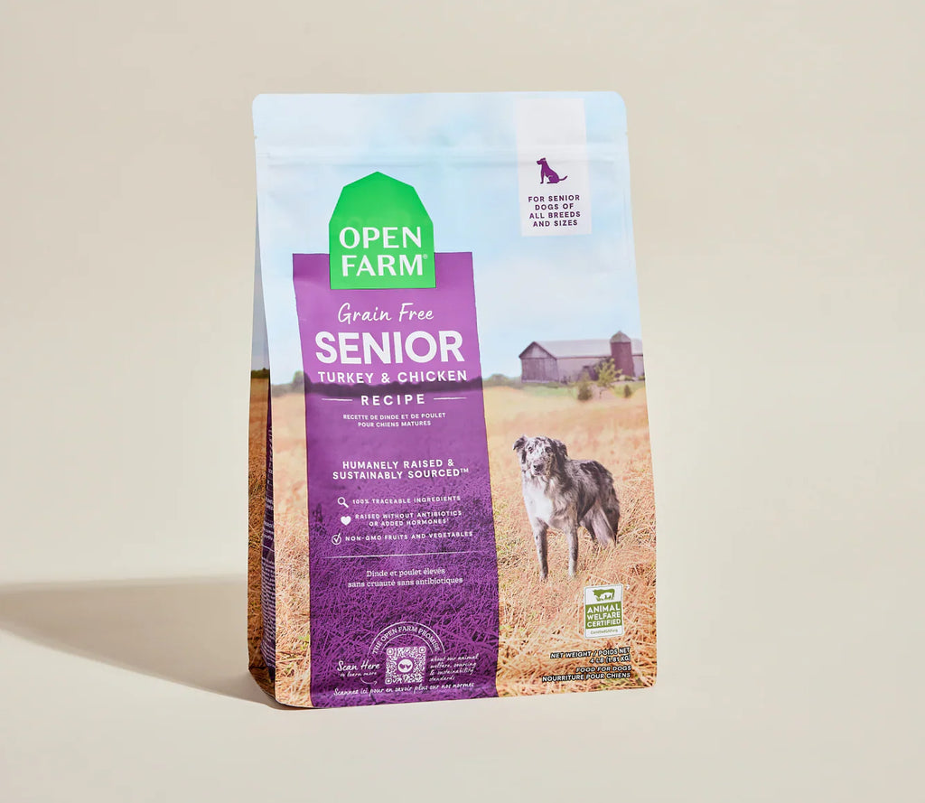 Open Farm senior dog food package on a beige background