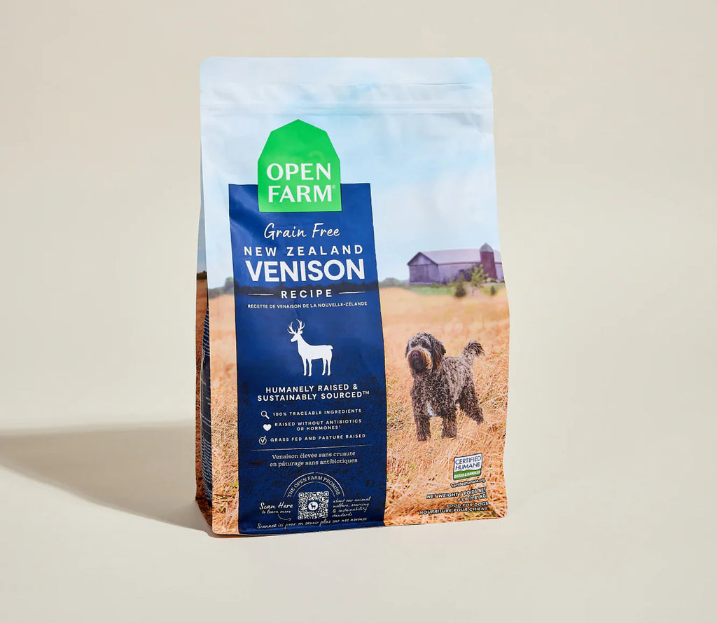 Open Farm New Zealand Venison recipe dog food package on a beige background