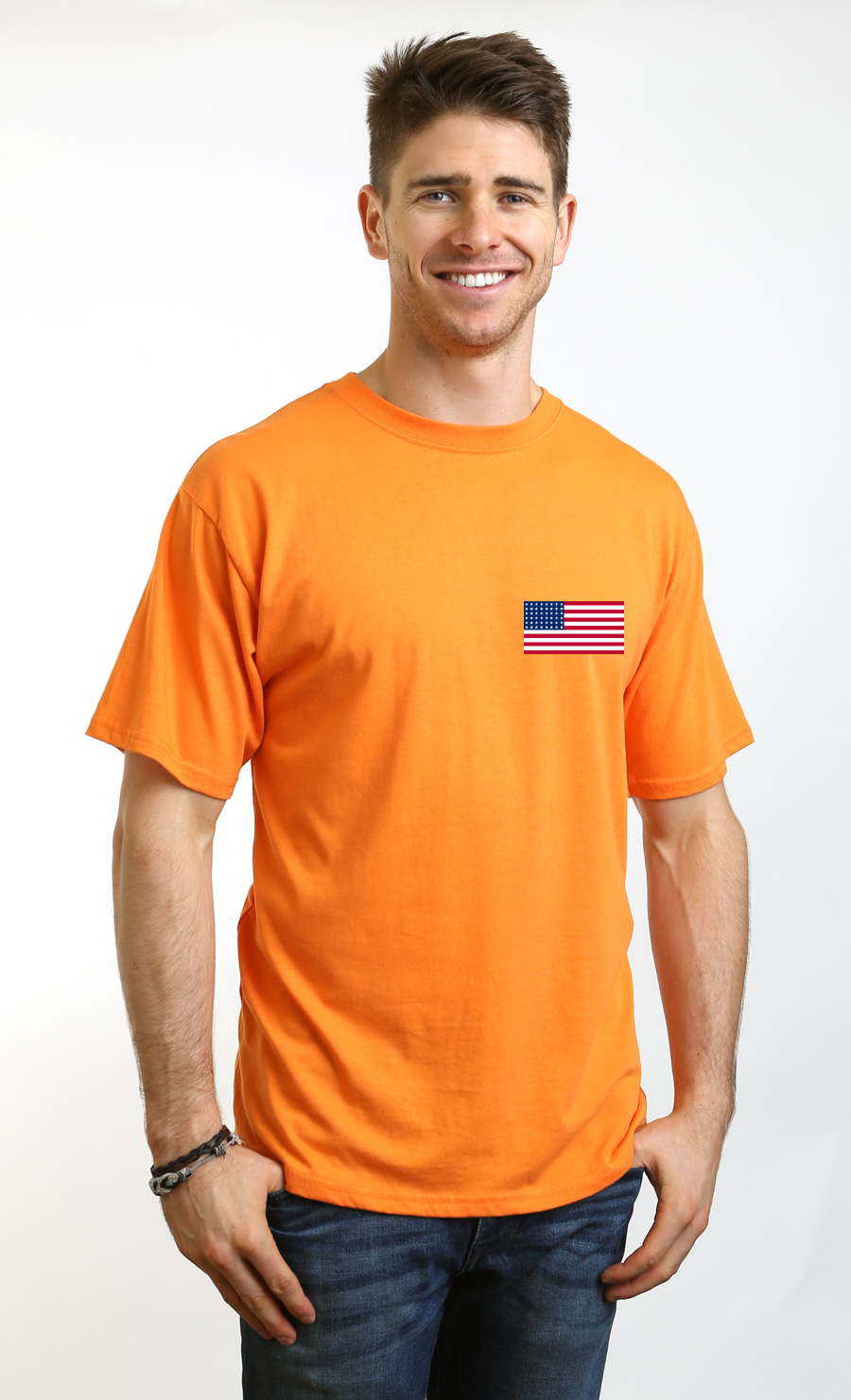 Man wearing an orange t-shirt with a small American flag on a white background