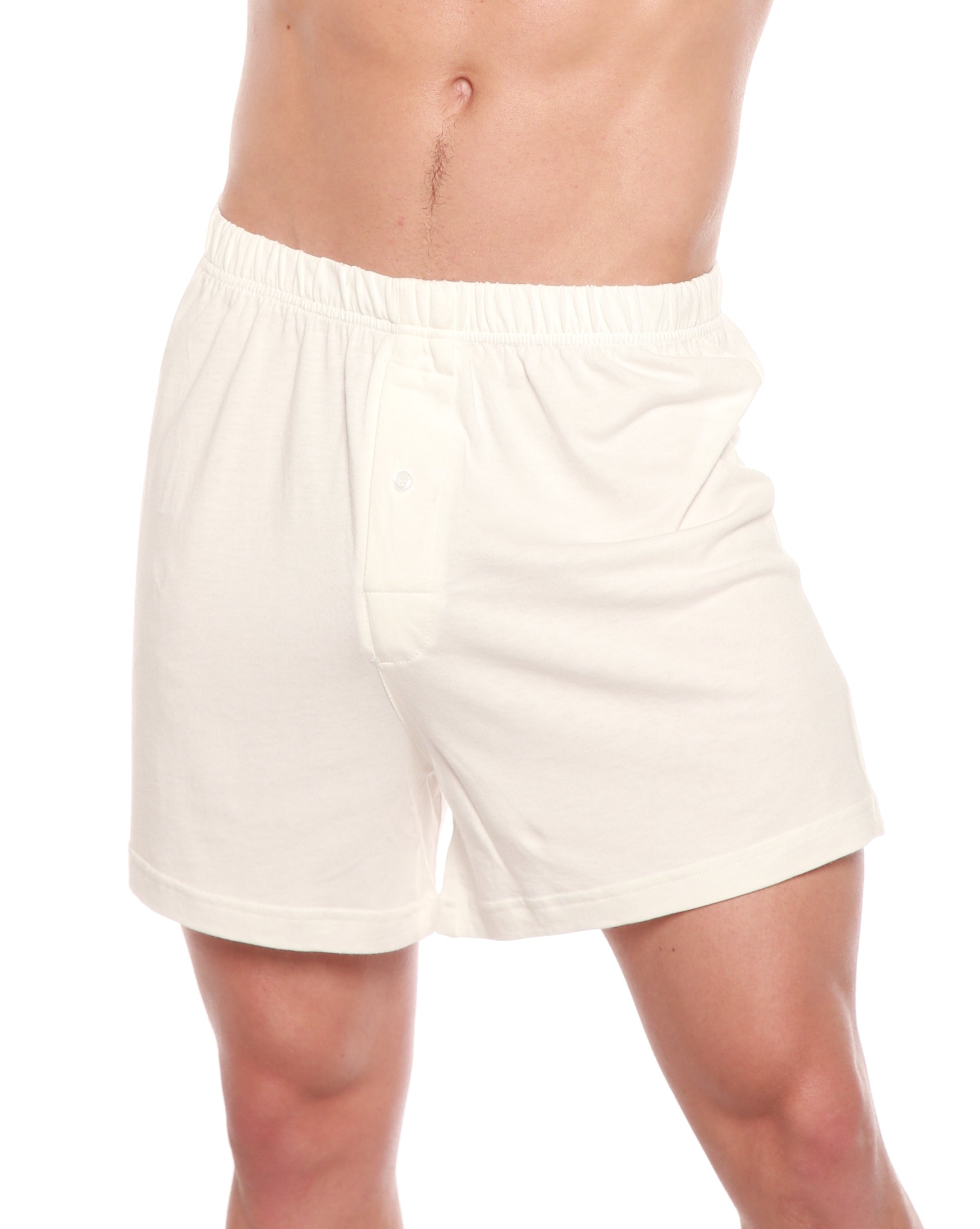 White shorts worn by a person on a white background