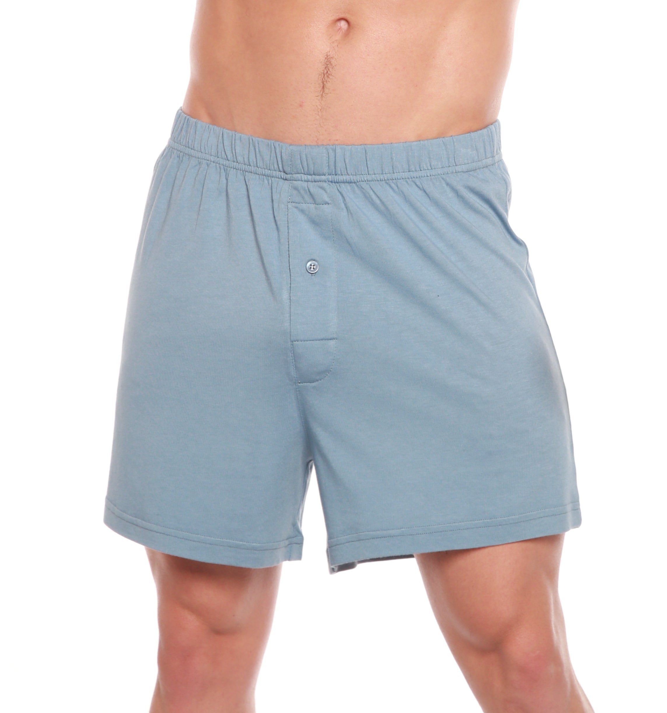 Light blue shorts worn by a person on a white background