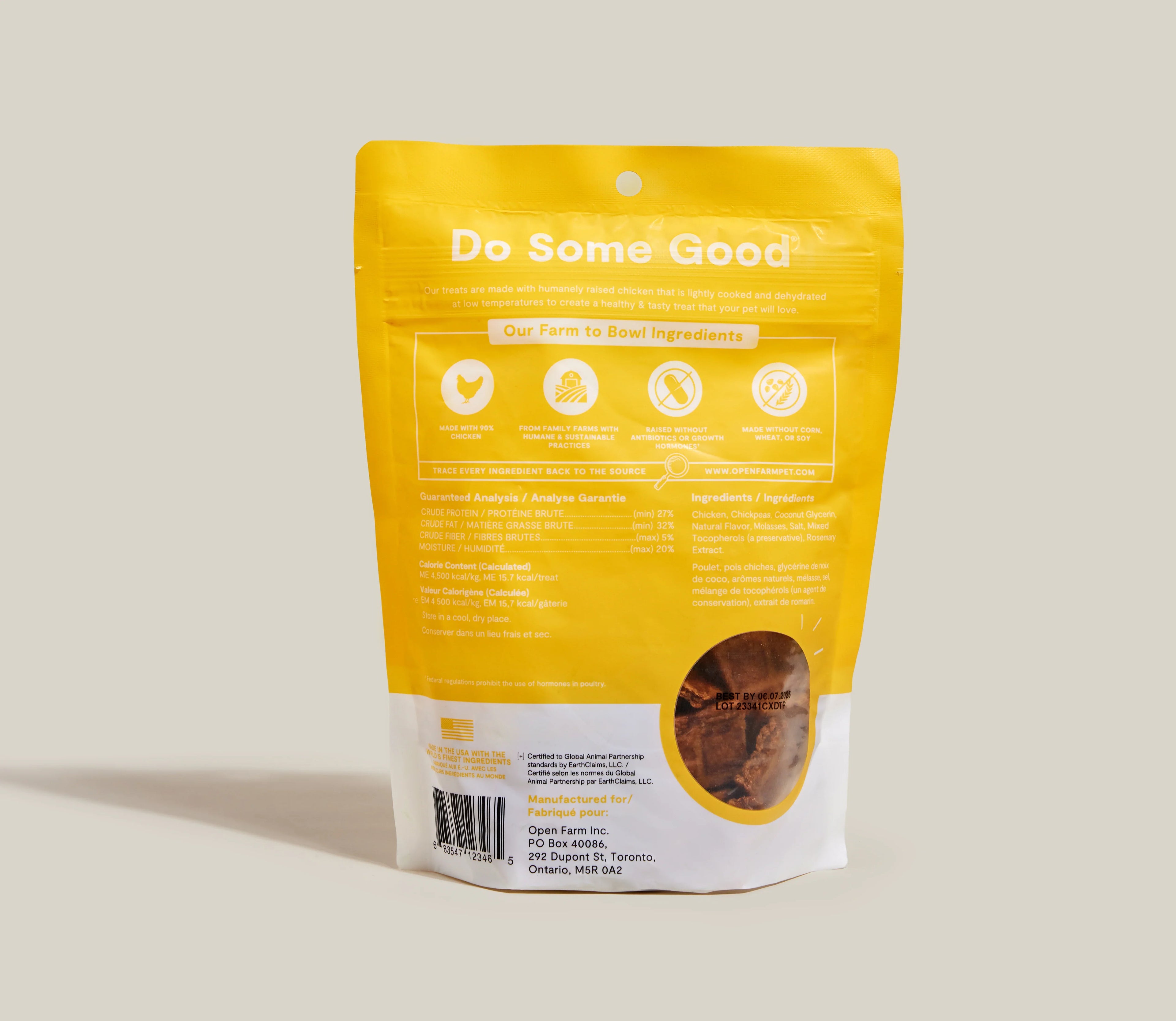 Yellow pet food packaging with 'Do Some Good' text on a beige background