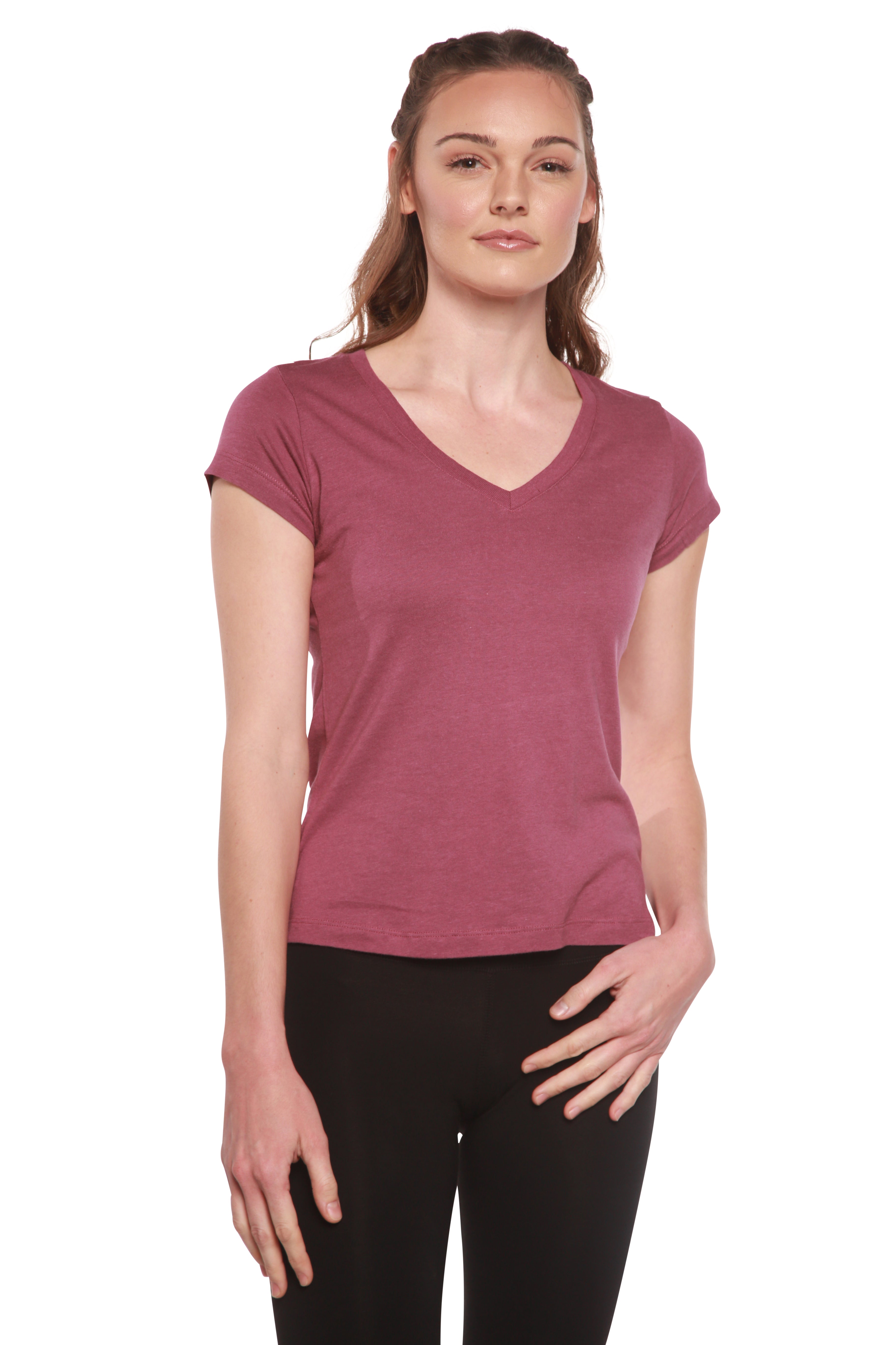 Woman wearing a mauve t-shirt on a white background